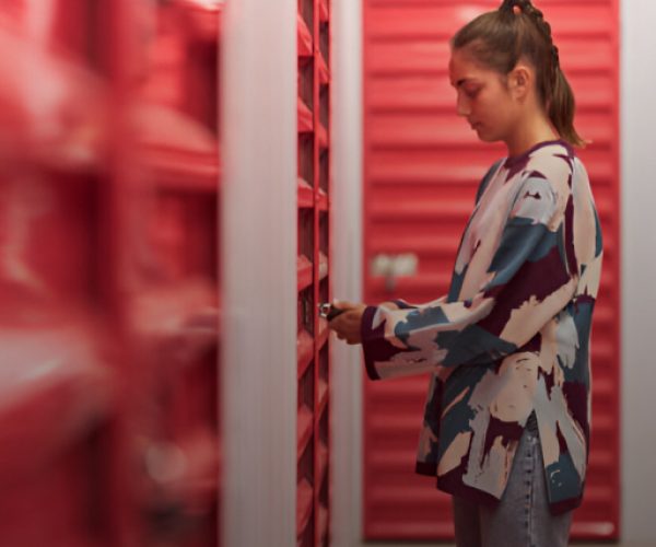 A women accessing her storage space with the help of a locker
